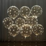 Light Up LED Balloons 12 Pack 20 Clear Bobo Balloons with 10ft Warm White LED String Lights 3 Light Modes Batteries Included Perfect for Parties Weddings Christmas & Outdoor Decorations – Stress Relief Squishy