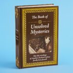 Publications International Ltd The Book of Unsolved Mysteries Featuring Amelia Earhart’s Plane Wreckage Mystery