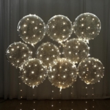 Light Up LED Balloons 12 Pack 20 Clear Bobo Balloons with 10ft Warm White LED String Lights 3 Light Modes Batteries Included Perfect for Parties Weddings Christmas & Outdoor Decorations – Stress Relief Squishy